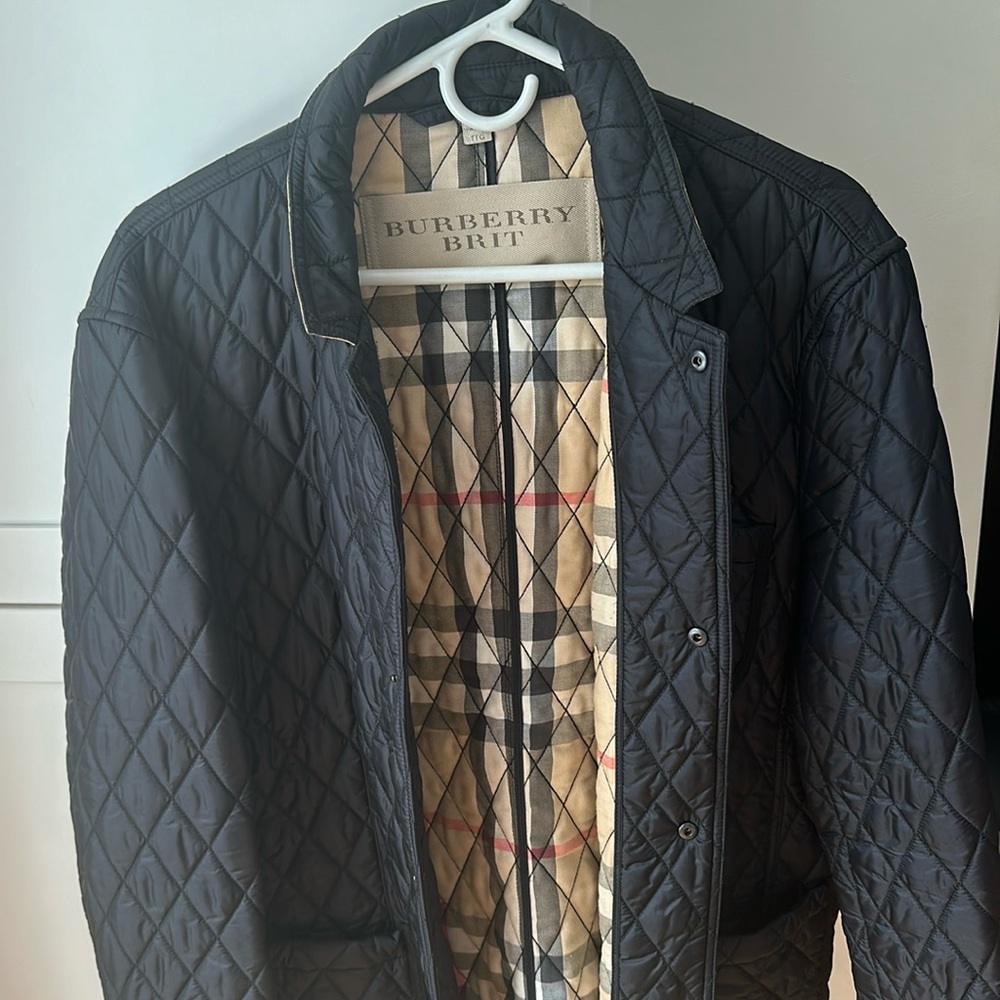 Almost new black quilted fall or spring  men’s jacket xxl but runs small